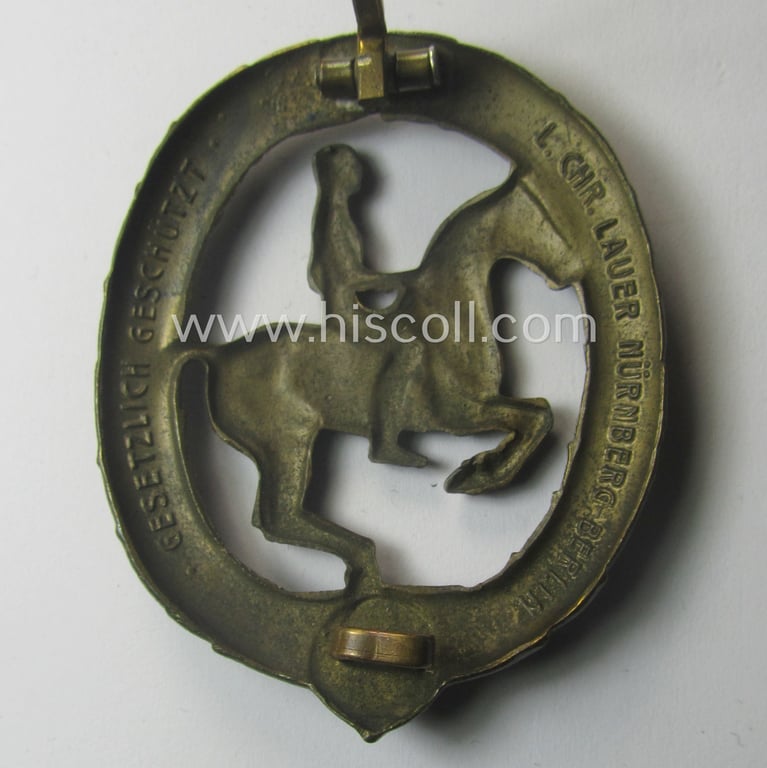 'Deutsches Reiterabzeichen der 3. Klasse (ie. 'in Bronze') being a maker- (ie. 'L.Chr. Lauer'-) marked example