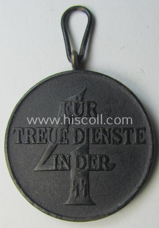 Superb - and actually rarely encountered! - 'SS-Dienstauszeichnung der 4. Stufe' (or black-toned, loyal-service medal for 4 years of loyal-service in the SS) that comes together with its original (and slightly used) ribbon (ie. 'Bandabschnitt')