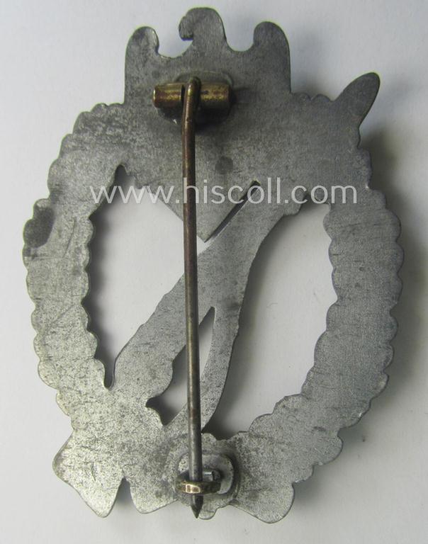 'Infanterie Sturmabzeichen in Silber' being a (typical) non-maker-marked and/or quite converse, 'solid-back' example as was executed in greyish-silver-coloured, zinc-based metal by the maker: 'Frank & Reif'
