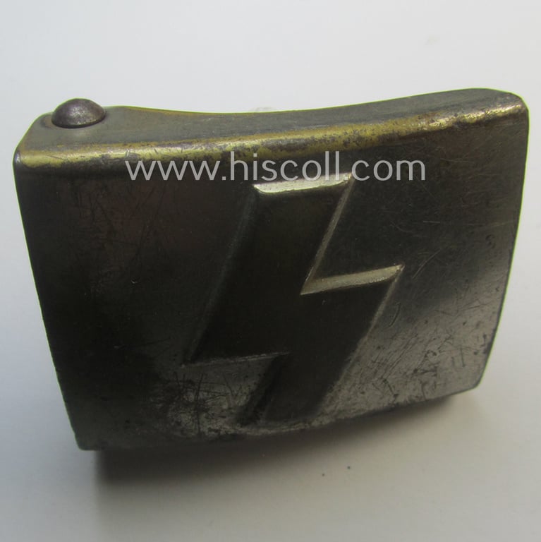 DJ (ie. 'Deutsches Jungvolk') silver-coloured- (ie. typical nickle-chromed) belt-buckle (ie. 'Koppelschloss') a neatly (double!) maker (ie. 'RzM 17' and/or 'A' ie. 'Assmann & Söhne') marked specimen