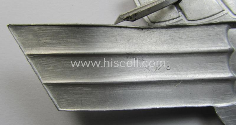 Aluminium-based so-called: N.S.K.K. (or: 'National Socialistisches Kraftfahr Korps') crash-helmet eagle-device (ie. 'Adler für N.S.K.K.-Sturzhelm') being a neatly maker- (ie. 'RzM M1/8'-) marked example of the second pattern