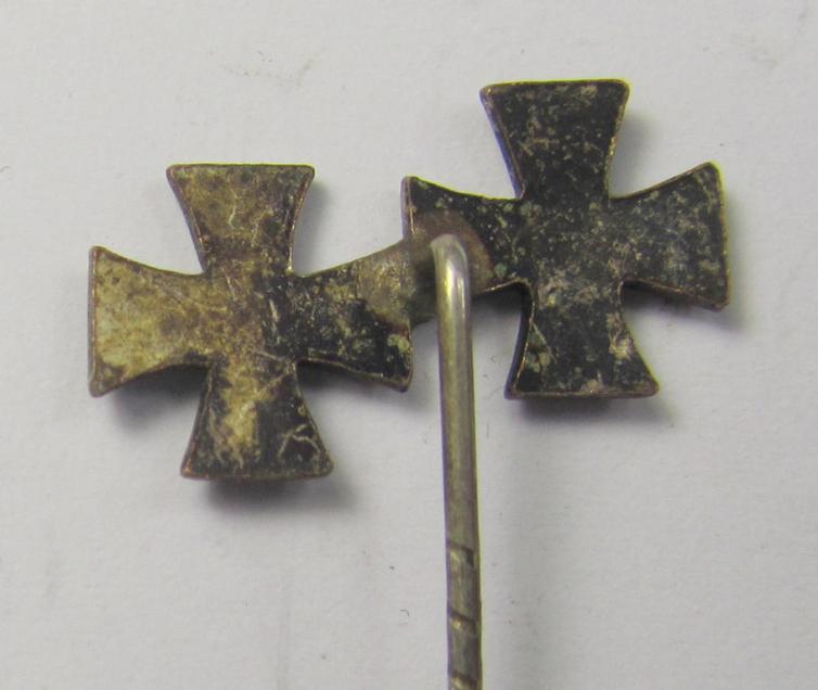Detailed, 9-mm.-sized medal-lapel-pin, being a non-maker-marked example depicting respectively: an 'EK I. Klasse' and an: 'EK II. Klasse'