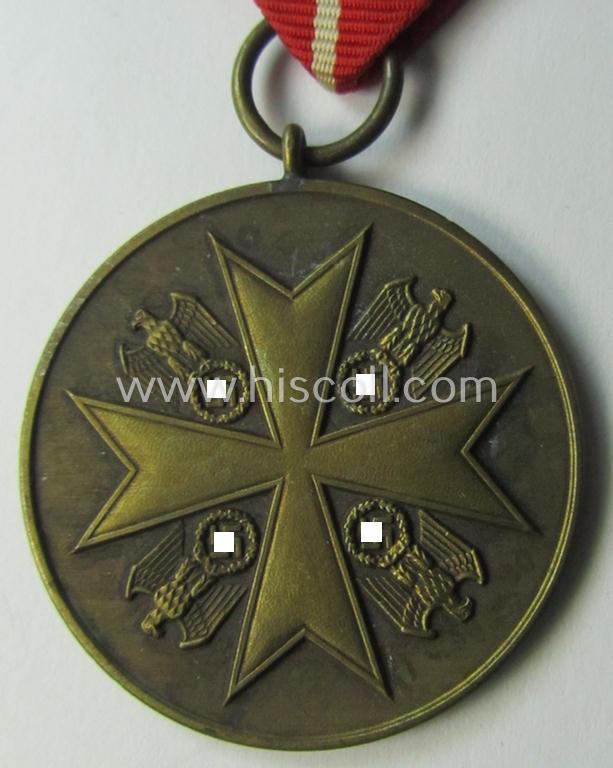 'Deutsche Bronzene Verdienstmedaille des Deutschen Adler Ordens ohne Schwn.' being a '30'-marked example
