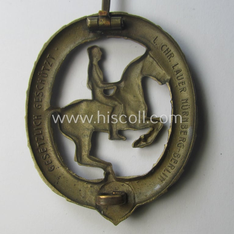 'Deutsches Reiterabzeichen der 3. Klasse (ie. 'in Bronze') being a maker- (ie. 'L.Chr. Lauer'-) marked example