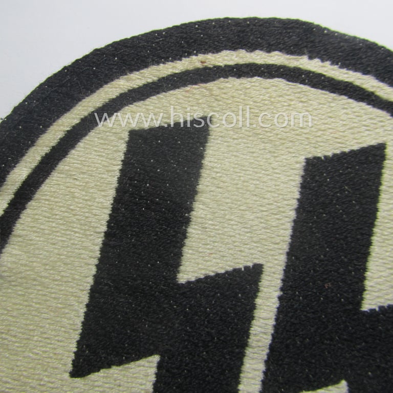 Waffen-SS sports'-shirt emblem as executed in the neat 'BeVo'-weave pattern that is void of its: 'RzM'-etiket and that comes in an overall nice- (ie. moderately used- ie. tunic-attached-), condition