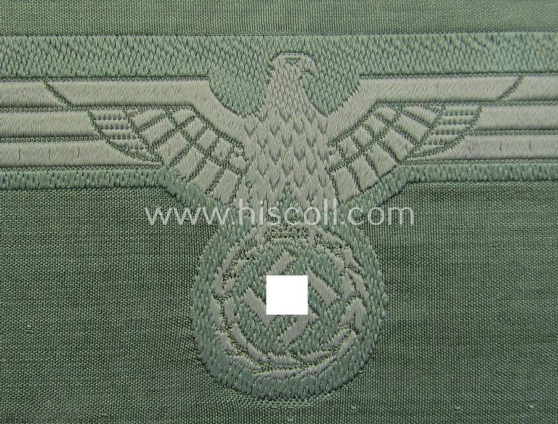 WH (Heeres) related breast-eagle (ie. 'Brustadler für Mannschaften u. Uffz. des Heeres') being a 'standard-issue'-pattern-example as executed in the 'BeVo'-weave-pattern on a field-grey-coloured background