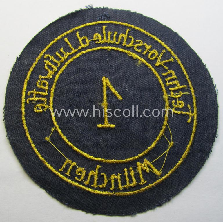 Attractive - and truly scarcely encountered! - HJ- (ie. 'Flieger-HJ') specialist-armbadge (or: 'Schulabzeichen') depicting the text: '1. Techn. Vorschule d. Luftwaffe - München'