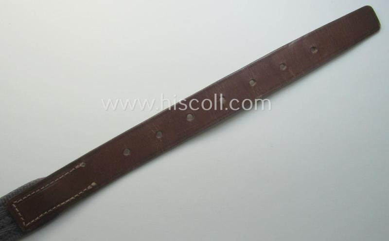 'Standard-issue'-pattern, WH trousers'-belt (or: 'Riemen für Hosen') as was executed in a combination of roughly woven blue-coloured linnen and/or brown-coloured leather