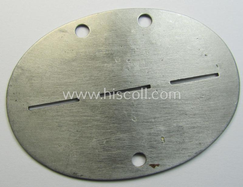 Aluminium-based, WH (Luftwaffe-) ie. 'Flieger'-related ID-disc, bearing the clearly stamped- and/or: 'coded'-unit- ie. 'MOB'-designation that reads: 'B65113' (and as such belonging to a soldier who served within the: '9./Kampfgeschwader 51'...