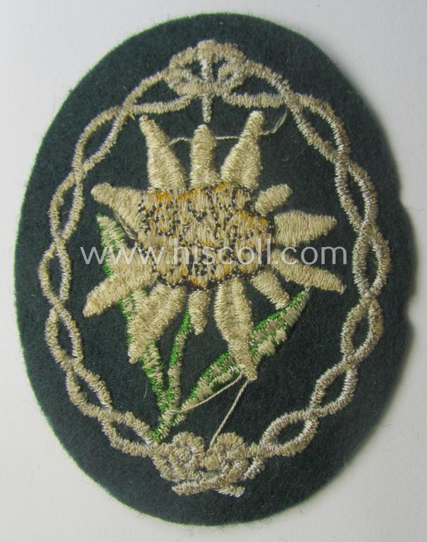 WH (Heeres) EM- (ie. NCO-) type: 'Edelweiss'-armpatch (being a machine-embroidered specimen)