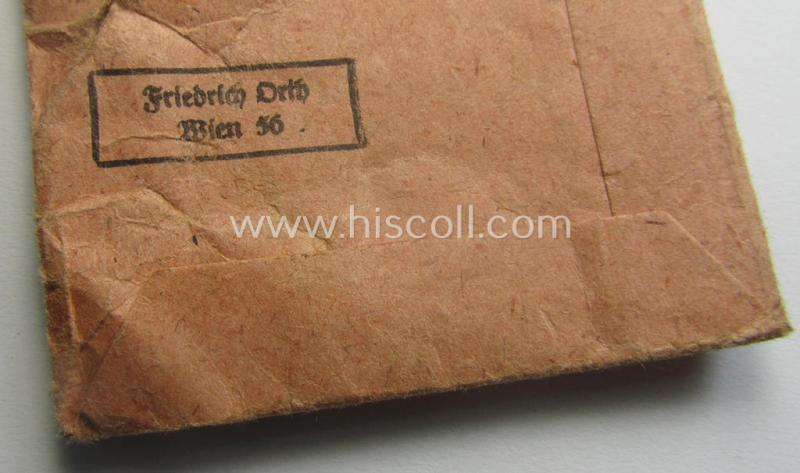 Neatly maker- (ie. '15'-) marked medal: 'Winterschlacht im Osten 1941/42' that came stored in its period pouch by the (Austrian-based) company: 'Friedrich Orth'