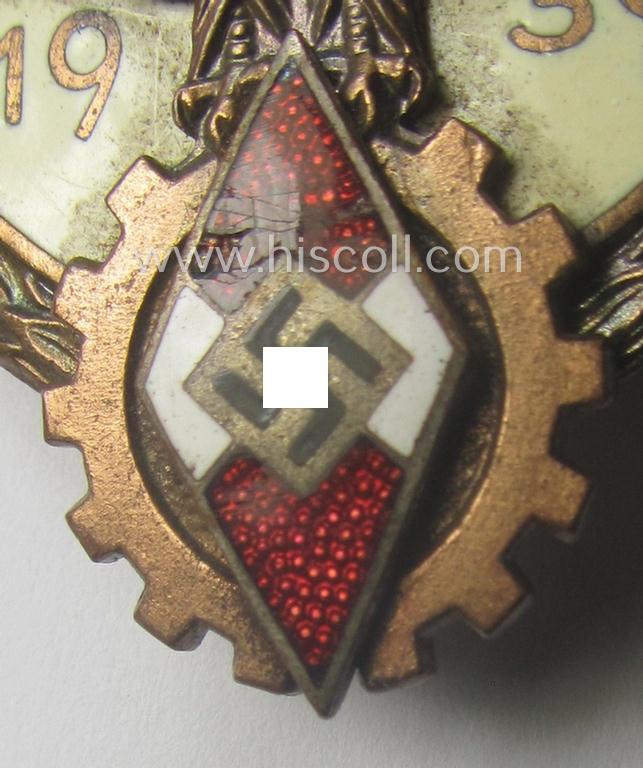 'HJ'- ('Hitlerjugend') ie. 'BDM'- ('Bund Deutscher Mädel') related: 'Reichsberufswettkampf-Siegerabzeichen' (of the 2nd model) entitled: 'Kreissieger 1939' and being a neatly maker- (ie.: 'H. Aurich'-) marked example