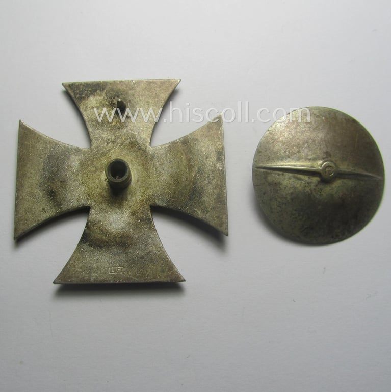 Moderately used, 'Eisernes Kreuz 1. Klasse' (or: Iron Cross 1st class), as executed in the scarcely seen so-called: 'screw-back-version', being an 'L/54'- (= 'S&H'-) marked example
