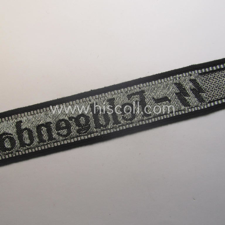 Superb - and truly rarely encountered! - example of a Waffen-SS, 'semi-BeVo'-pattern, EM- (ie. NCO-) type cuff-title (ie. 'Ärmelstreifen') as was intended for a member serving within the: 'SS-Feldgendarmerie'