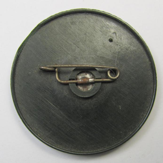 Resin-based- and darker-green-coloured, WHW- (ie. 'Winterhilfswerk'-) related day-badge (ie. 'tinnie' or: 'Veranstaltungsabzeichen') bearing the text: 'Wir gehören zusammen dann sind wir alles - Gau Halle-Merseburg - 1936-1937'