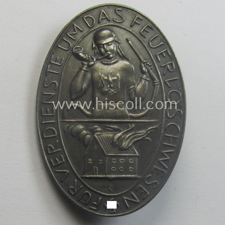 Pre-war-period- and/or genuine silver-based, so-called: 'Erinnerungszeichen Verdienste um das Feuerlöschwesen 1934' being a detailed- and maker- (ie. 'Preuss. Staatsmünze'-) marked, example that comes in its etui