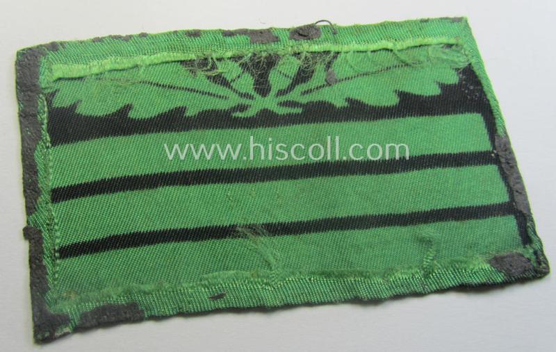 Single - and clearly tunic-removed! - officers'-pattern, WH (Heeres o. Waffen-SS) rank-insignia-bar (for usage on the camouflaged-uniforms) as used by an officer holding the rank of: 'Hauptmann' (ie.: 'SS Hauptsturmführer')