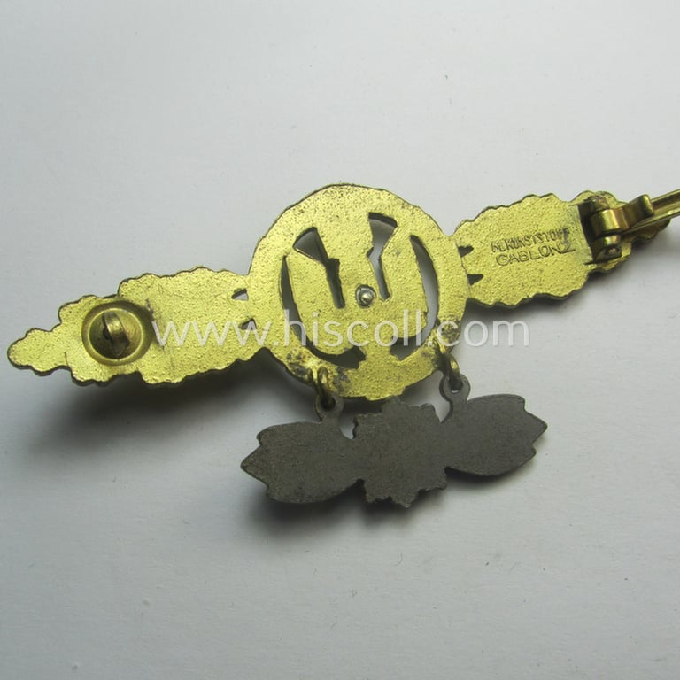 Attractive, WH (LW) 'Frontflugspange für Kampfflieger in Gold mit Stern-Anhänger' being a typical zinc- (ie. 'Feinzink'-) and maker-marked example bythe: 'Metall u. Kunstoff - Gablonz'-company