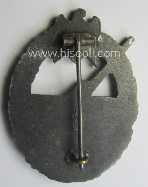 WH (KM) 'Marine-Artillerie-Abzeichen' being a maker- (ie. 'F.L.L. - 43'-) marked- and/or zinc- (ie. 'Feinzink'-) based example by the: 'Friedrich Linden'-company