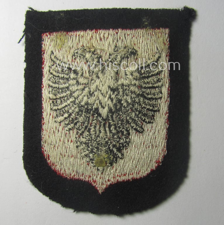 Waffen-SS 'volunteer'-arm-shield as was intended for usage by soldiers of the: '21. Waffen-Grenadier-Division der SS' “Skanderbeg” (ie. 'albanische Nr. 1') and that comes in a 'virtually mint- ie. unissued', condition