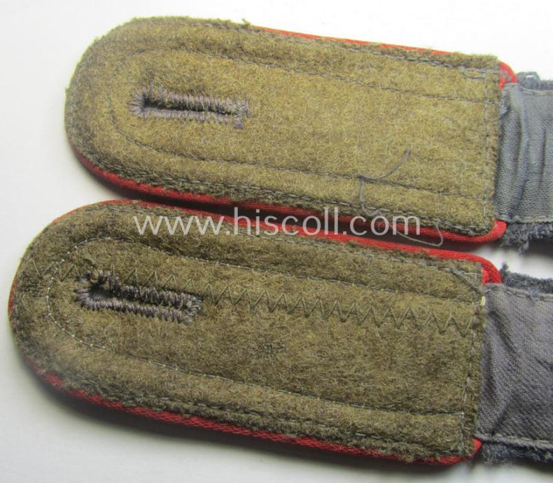 Pair of WH (Luftwaffe) NCO-type shoulderstraps as piped in the bright-red branchcolour as was intended for an: 'Uffz. o. Unterwachtmeister der Flak-Art.-Trpn.'