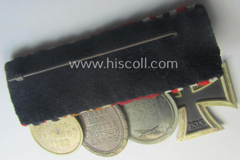 4-pieced, WWII-period medal-bar (ie. 'Ordenspange') showing resp. an: 'EKII.Kl.', a: 'Medaille Winterschlacht im Osten 1941-42' a: 'KvKII.Kl. m. Schw.', a: 'Westwall'-medal and 'Kriegsverdienstmed. 1939'