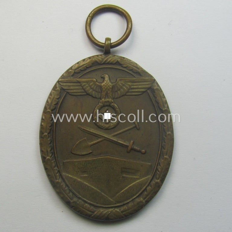 Medal-set: 'Deutsches Schutzwall Ehrenzeichen' (aka: 'Westwall'-medal) being a non-maker-marked- and/or: 'Buntmetall'-based specimen