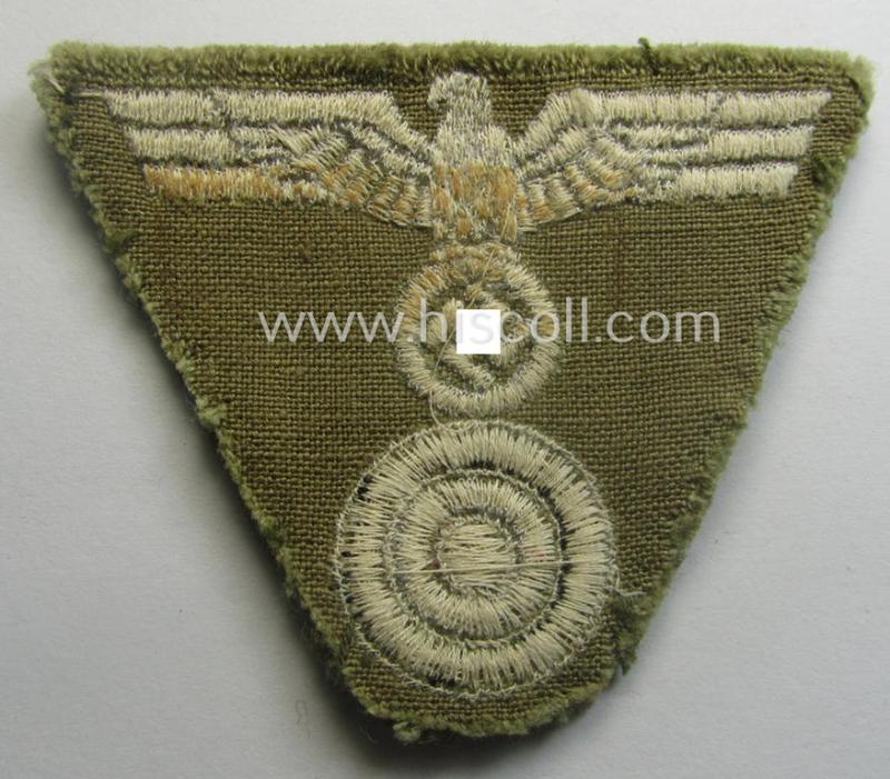 'Foreign-produced' (!) OT- (ie. 'Organisation Todt'-) related, so-called: 'M43-pattern'-cap-trapezoid (ie. 'Mützentrapez') as executed in machine-embroidered pattern onto a typical greenish-/brown-coloured- and/or woolen-based background