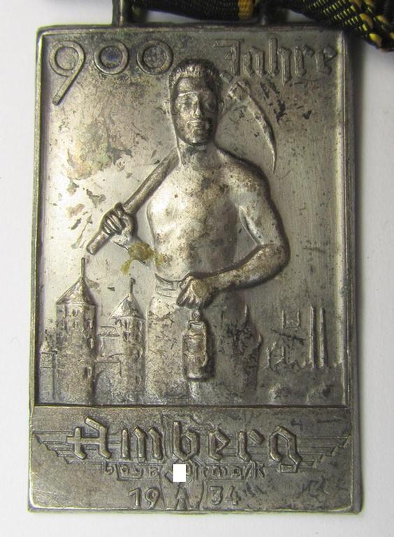 Commemorative, 'Buntmetall'-based 'Veranstaltungsabzeichen' (ie. 'tinnie') being a neatly maker- (ie. 'Carl Poellath'-) marked example that comes mounted on its ribbon showing the text: '900 Jahre Amberg - Bayr. Ostmark - 1934'