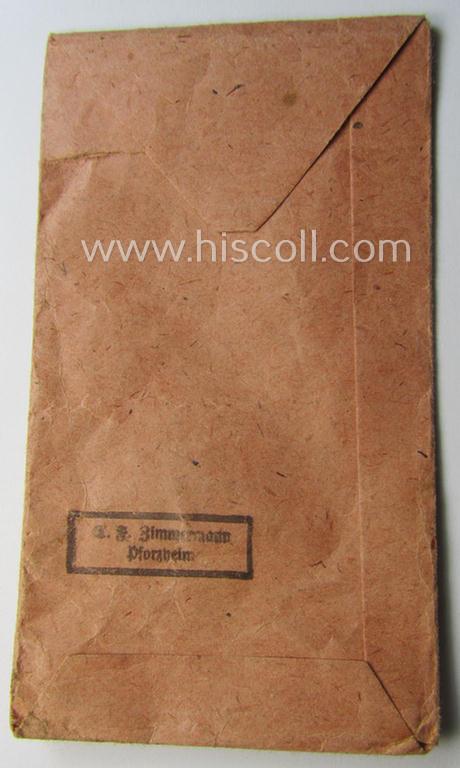Empty 'Zellstoff'-based pouch as was intended for a medal: 'Winterschlacht im Osten 1941/42' as was produced by the: 'C.F. Zimmermann'-company (ie. 'Hersteller 20')