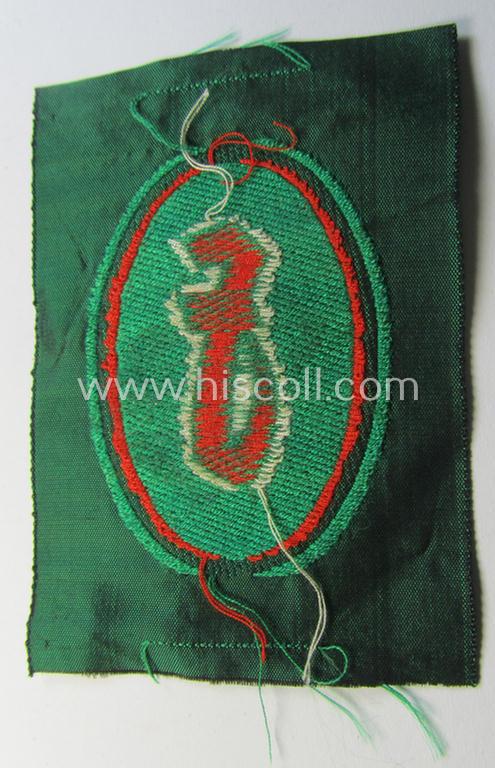 Attractive, 'Sicherheits- u. Hilfsdienst (SHD)' armbadge (ie. 'Ärmelabzeichen') as executed in 'BeVo'-weave pattern, as was intended for an SHD-member who served within the: 'Feuerlöschdienst' (or: fire-extinction-service)