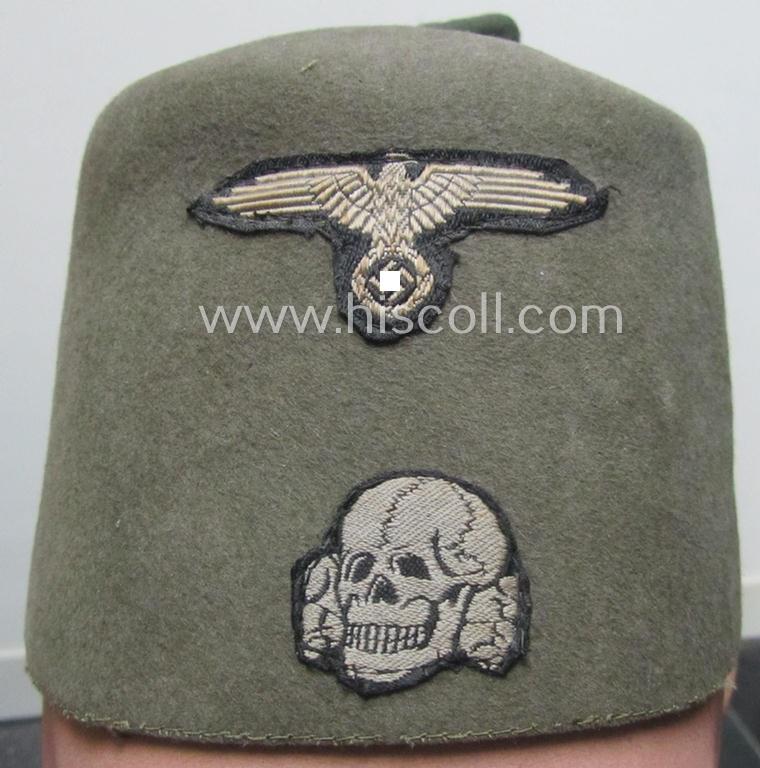 Superb - and rarely found! - field-grey-coloured and/or woolen-based: Waffen-SS 'Fez' (being a 'virtually mint- ie. unissued' example having a neat - and fully matching! - set of silver-grey-coloured 'BeVo'-insignia, originally-attached)