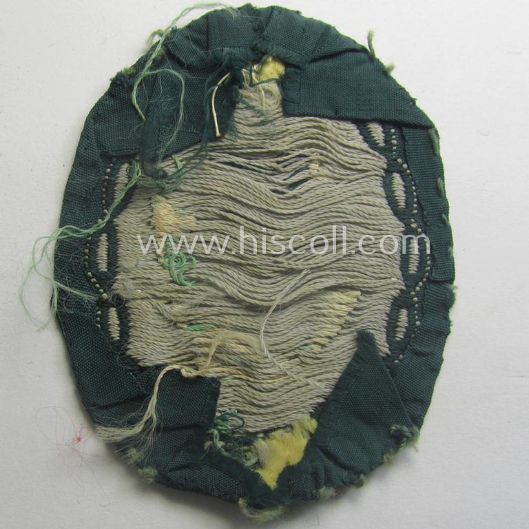 Truly used and/or tunic-removed, WH (Heeres) EM- (ie. NCO-) type, so-called: 'Edelweiss'-armpatch being a 'BeVo'-woven example as was executed on darker-green linnen as was specifically intended for usage by the: 'Gebirgsjäger-Trp.'