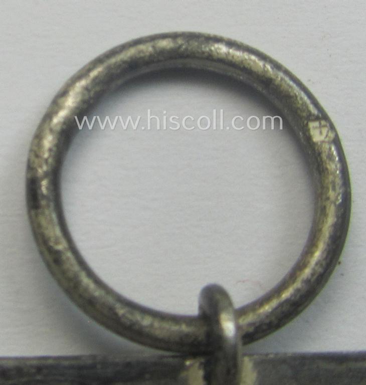 'EK II. Klasse' being a maker- (ie. '4'-) marked example that comes together with its original- and once-mounted ribbon (ie. 'Bandabschnitt') as was produced by the maker (ie. 'Hersteller'): 'Steinhauer u. Lück'