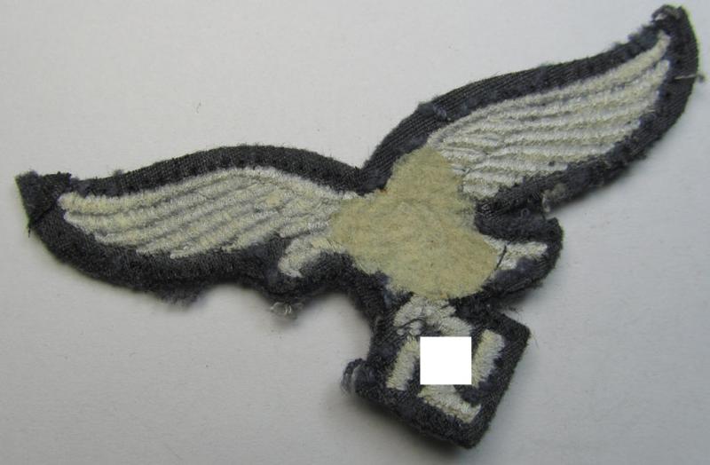 WH (Luftwaffe) 'standard-issue'-pattern breast-eagle (ie. 'Brustadler für Mannschaften u. Uffz. der Luftwaffe') being a machine-embroidered example and that comes in a neat and carefully tunic-removed condition