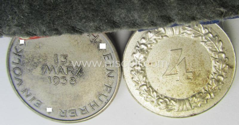Attractive example of a two-pieced medal-bar (ie.: 'Doppel- o. Ordenspange') resp. showing a: 'WH-DA 4. Stufe' (with firmly attached eagle-device) and an Austrian 'Anschluss'-medal '1 März 1938'