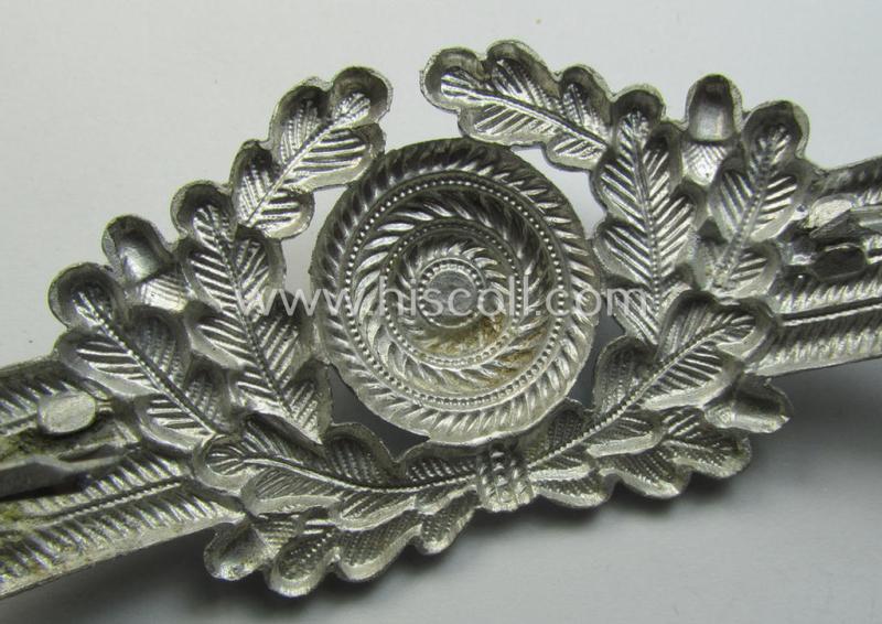 WH (Luftwaffe) related (and aluminium-based!) visor-cap-cocarde (ie. 'Schirmmützenkokarde für Uffz. u. Mannschaften der Luftwaffe) being a very nice example that comes in a 'virtually mint- ie. unissued'-, condition