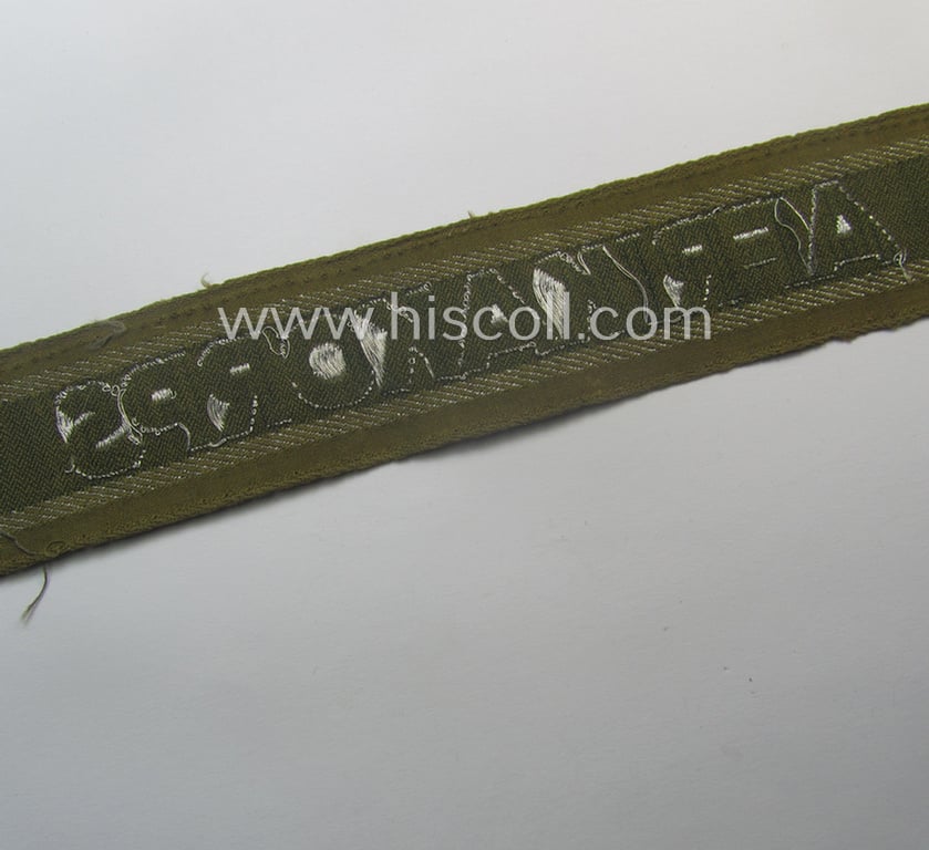 'BeVo'-like cuff-title (ie. 'Ärmelstreifen') entitled: 'Afrikakorps' being a clearly issued example that comes in an overall nice- (ie. hardly shortened- and just moderately worn-), condition