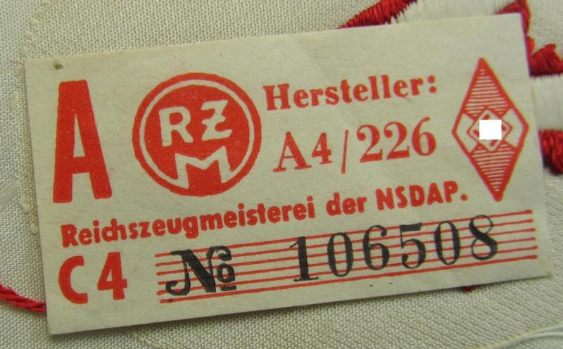 Superb, HJ/BDM (ie. 'Hitlerjugend'/'Bund Deutscher Mädel') trade- or specialist armbadge as executed in neat 'BeVo'-weave pattern as was intended for usage by a: 'Feldscher' (or: medical orderly) still retaining its period 'RzM'-etiket