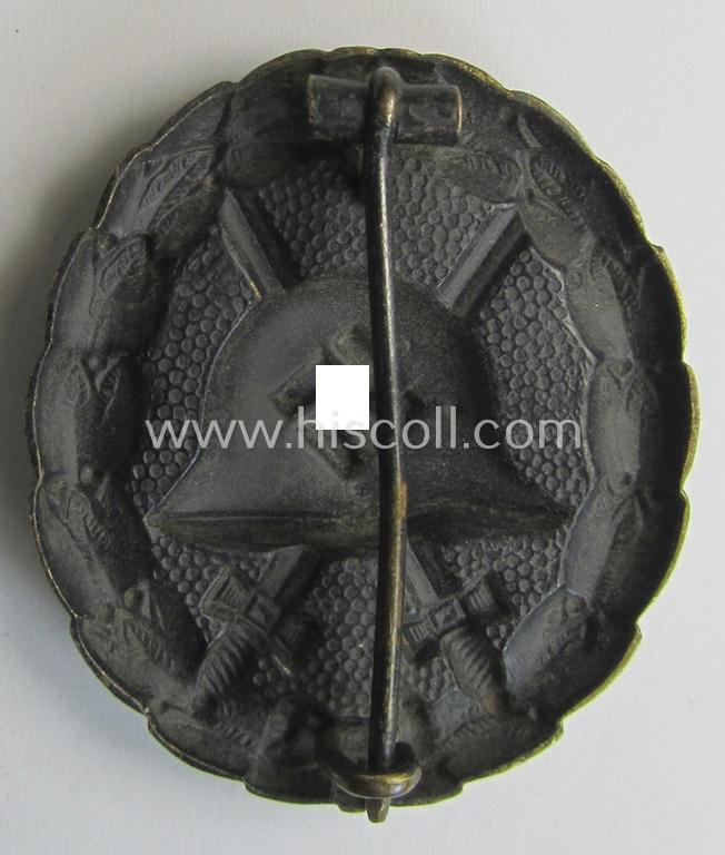 Attractive, early-pattern, black-class wound-badge (ie.: 'Verwundeten Abzeichen in Schwarz') being a detailed so-called: 'Spanish Civil-War'-version that comes in a moderately used- and/or worn, condition