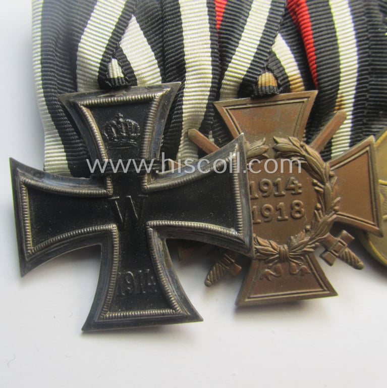 3-pieced, 'WWI'- (ie. TR-) related medal-bar (ie. 'Ordenspange') resp. depicting a WWI-period: 'EK II.Kl.', a: 'FKK 1914-18 mit Schwn.' and a: 'Kriegsverdienstmedaille 1939'