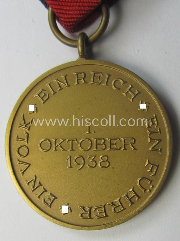 WH Czech-occupation- (ie. 'Anschluss'-) medal: '1. Oktober 1938' that comes with its period-attached 'PB-Spange' and that comes stored in its bordeaux-red-coloured- and/or non-maker-marked etui