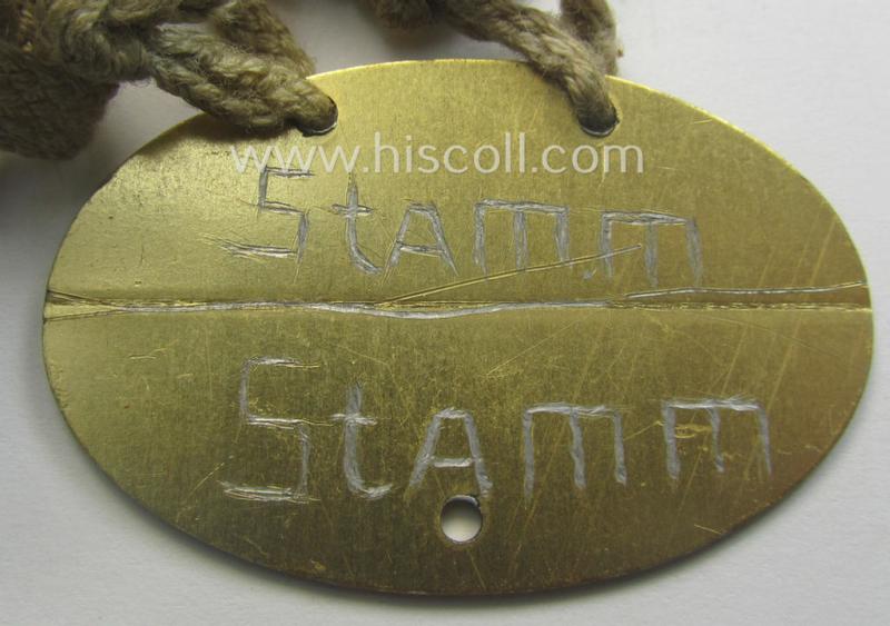 Unusually found - albeit 'standard-issue'-pattern - WH (Kriegsmarine) typical aluminium-based- and/or bright golden-bronze toned ID-disc (ie. 'Erkennungsmarke') bearing the engraved coded numeral (ie. text) that simply reads: 'F.617 Wehr.Beamt.M...