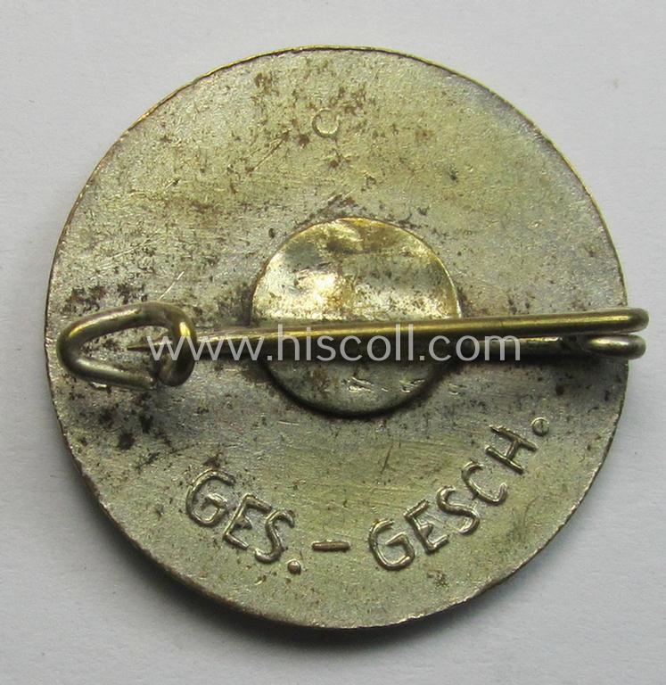 Superb - bright-red-coloured-, 'variant'-pattern and I deem early-period! - 'N.S.D.A.P.'-membership-pin- ie. party-badge (or: 'Parteiabzeichen') being a non-maker-marked specimen that bears a: 'Ges.Gesch.'-patent-pending-designation