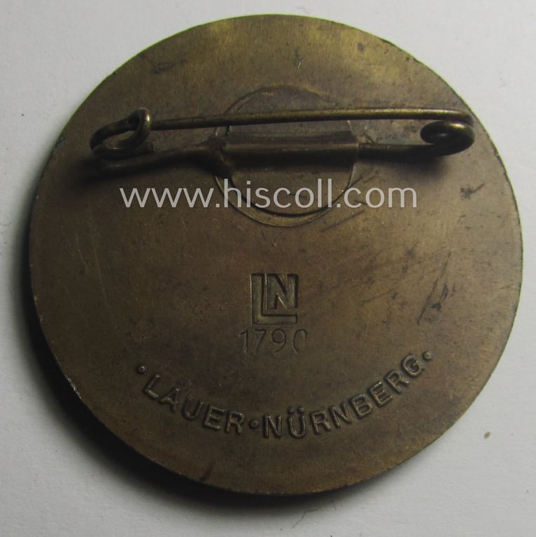 Fairly luxuriously styled, so-called: N.S.D.A.P.-related 'tinnie' (ie. 'Tagungs- o. Veranstaltungsabzeichen'-) being a maker- (ie. 'LN 1790 - Laurer-Nürnberg'-) marked example depicting the text: 'Reichsparteitag 1935'