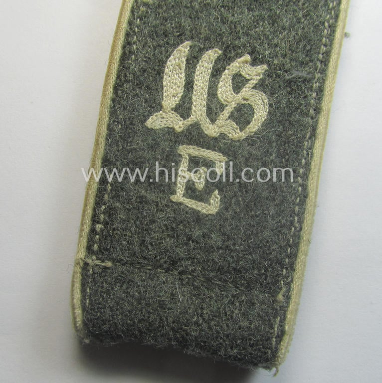 Single - albeit nevertheless rarely seen! - WH (Heeres) NCO-type, 'M41- (ie. 43'-) pattern- and neaty 'cyphered' shoulderstrap as was intended for usage by a: 'Soldat der Inf.-Truppen u. Mitglied der Unteroffiziersschule Ettlingen'