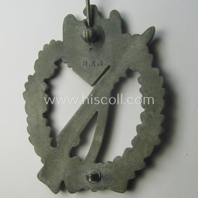 'Infanterie-Sturmabzeichen in Silber' (or: silver-class infantry-assault badge ie. IAB) being a neatly maker- (ie. 'MK 4'- or: 'Metall u. Kunststoff'-) marked example as executed in greyish-silverish-coloured 'Feinzink'