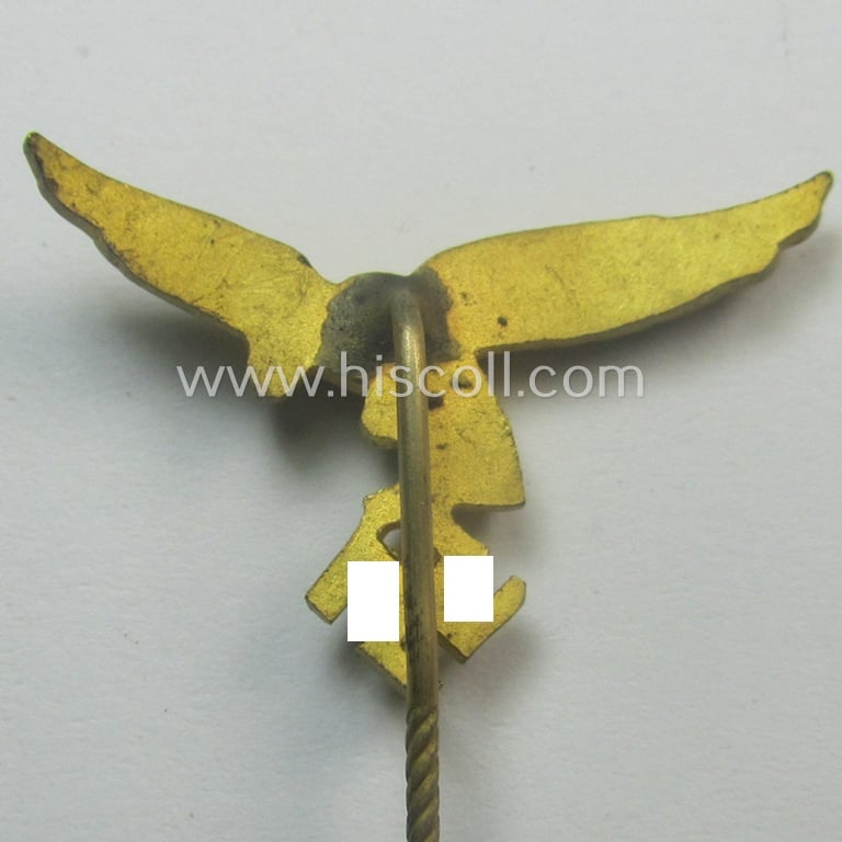Bright golden-toned lapel-pin (ie. 'Zivilabzeichen') to be worn on the civil attire as was intended for usage by the various staff-members of the 'Luftwaffe' (depicting an early-pattern- ie. 'down-tailed'-eagle-device)