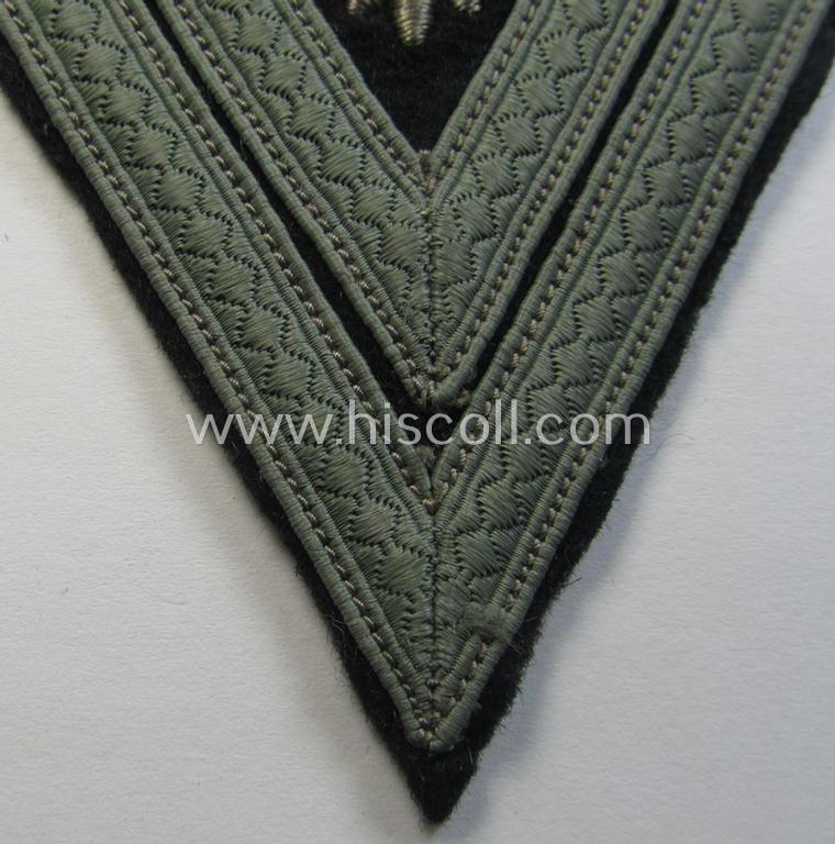 WH (Heeres) Pz-'Armwinkel' (or: rank-chevron) as intended for usage on the black-coloured 'Panzer'-type 'wrap-around'-tunics as was intended for usage by a soldier with the (unusually encountered!) rank of: 'Stabsgefreiter'