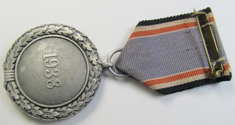 Neat, 'Luftschutz-Ehrenzeichen 2. Stufe' being a non-maker-marked example, as executed in (heavy) zinc-based metal (ie. 'Feinzink') and that comes mounted onto its period ribbon ie. 'Bandabschnitt'
